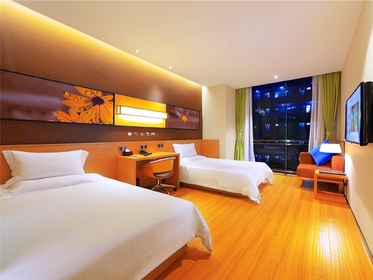 Iu Hotel Ruoyang Yiyang Wenhua Road Esterno foto