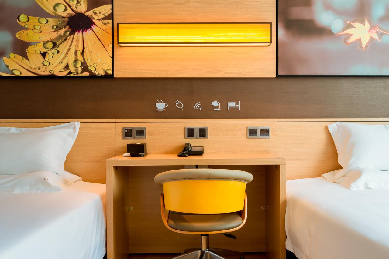 Iu Hotel Ruoyang Yiyang Wenhua Road Esterno foto